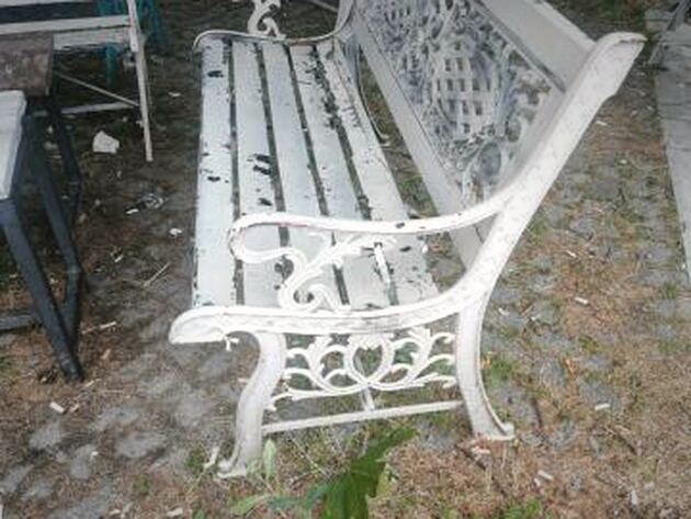 Cast Iron Garden Bench, White & Blue — white cast iron bench with ornate scrolled ends and worn paint